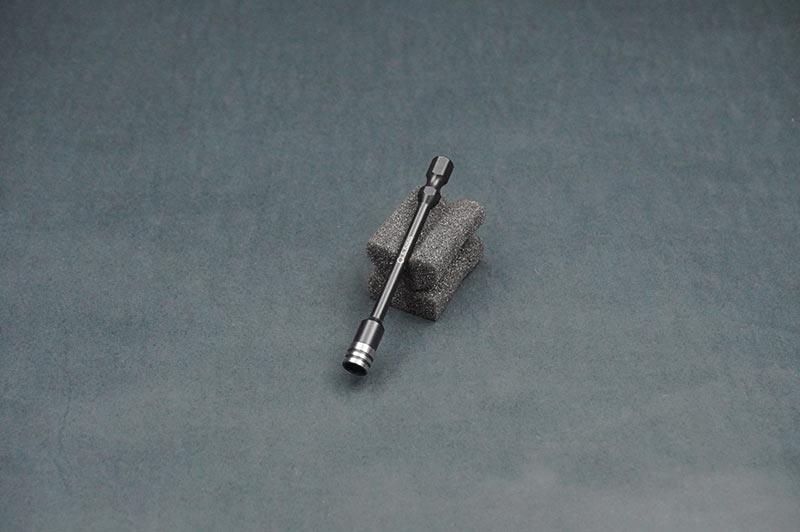 Koswork KOS13207-N55 black metal RC car tool with hex tip on foam block, RC accessory