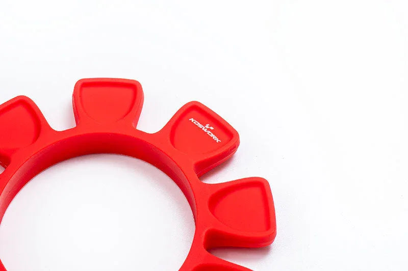 Red Koswork silicone RC car tire holder with petal-shaped slots on white background