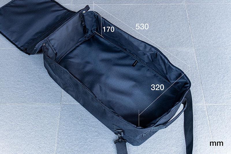 Large black RC pit bag with open lid, showing interior dimensions 530x320x170 mm.