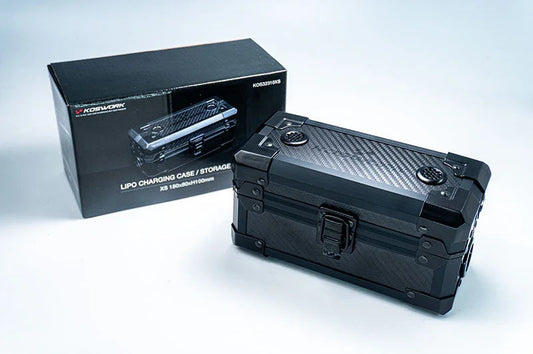 Koswork LiPo charging case for RC batteries with carbon fiber look, shown next to packaging.