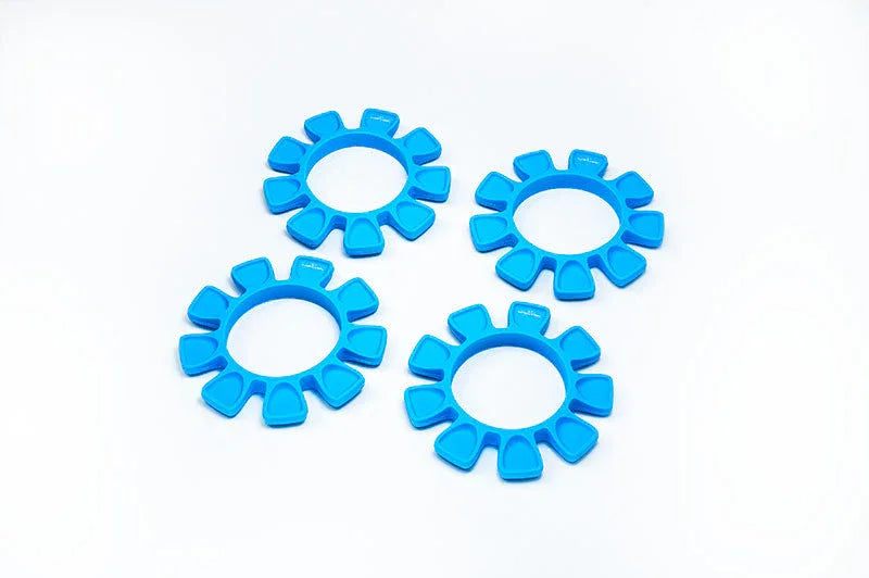 Set of four blue silicone RC tire gluing rings on a white background
