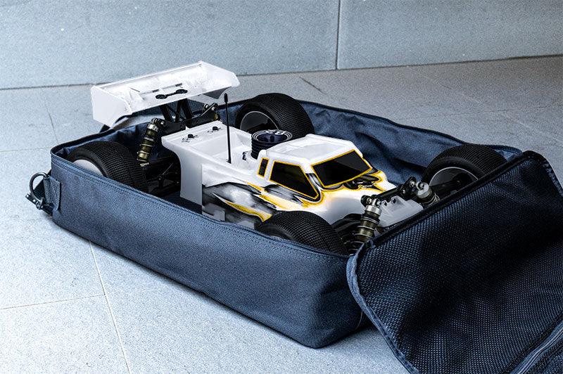 RC car stored in a durable racing pit bag on a tiled floor
