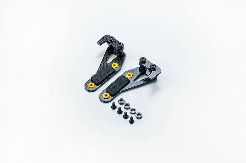 RC car carbon fiber suspension arm set with screws and washers on white background