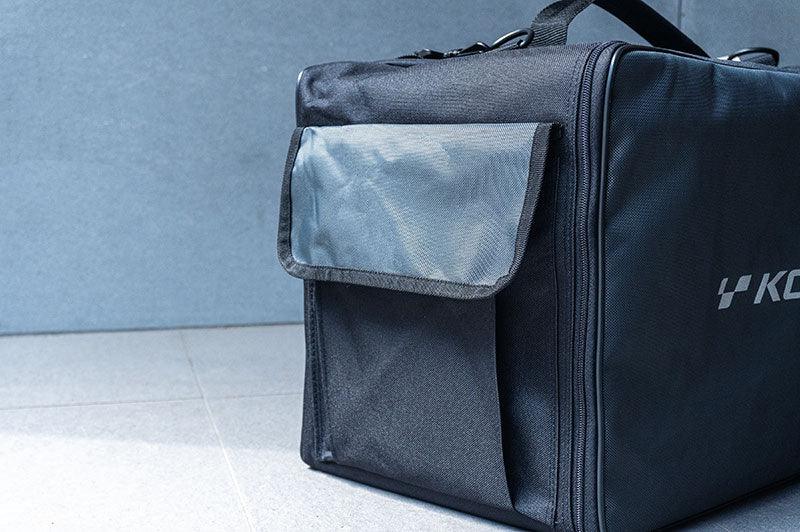 Large black RC pit bag with side pocket, durable fabric, and zipper for hobby tool storage