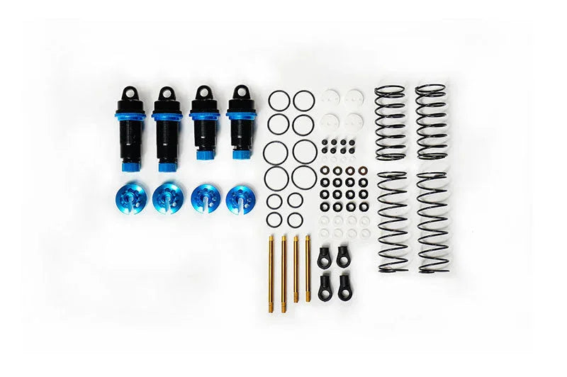RC car shock absorber kit with springs, dampers, O-rings, caps and hardware on white background