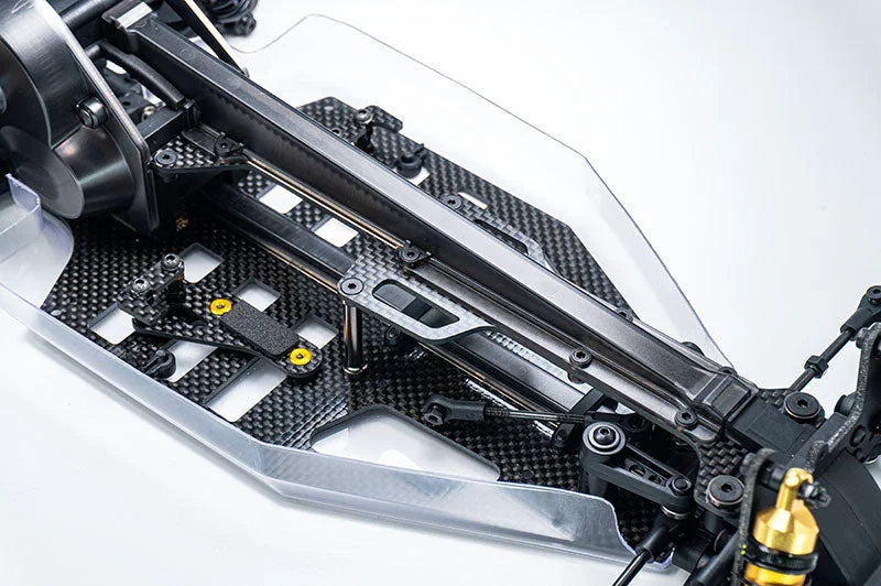High-performance RC car carbon fiber chassis and suspension parts closeup
