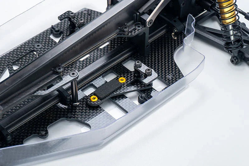 RC car carbon fiber chassis with side guard and suspension detail
