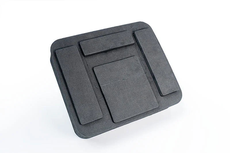 Black RC pit foam organizer insert with multiple rectangular compartments on white background
