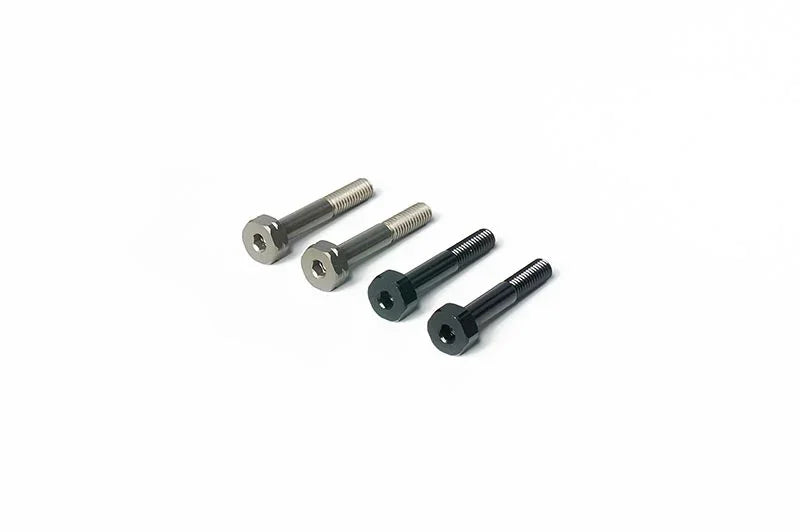 Set of four hex socket cap screws for RC car parts on white background
