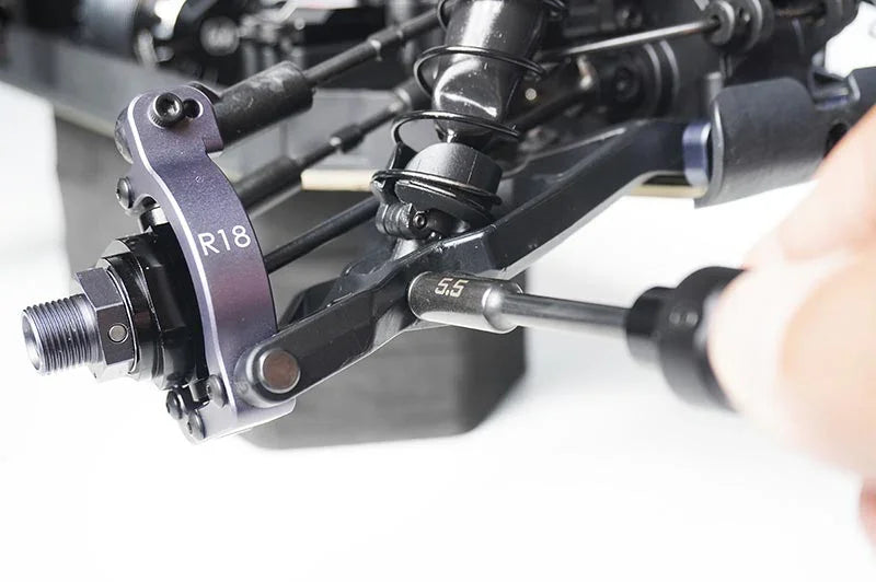 RC car suspension tuning with 5.5 mm hex wrench and visible R18 hub part
