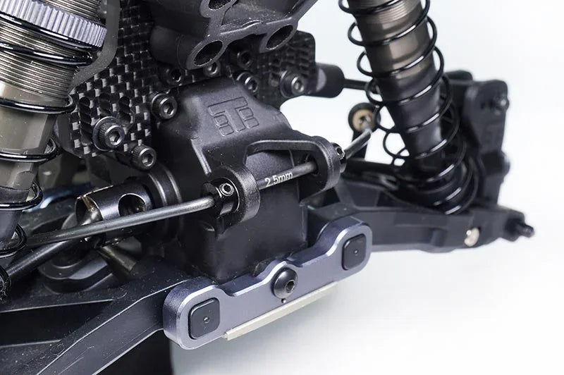 RC car suspension and shock absorber assembly with detailed metal and carbon fiber parts