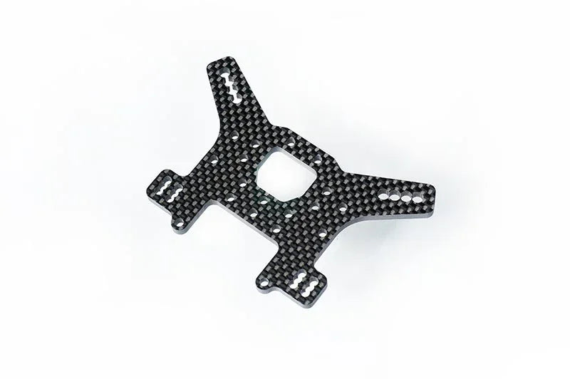 Carbon fiber RC car part with cutouts, displayed on a white background.