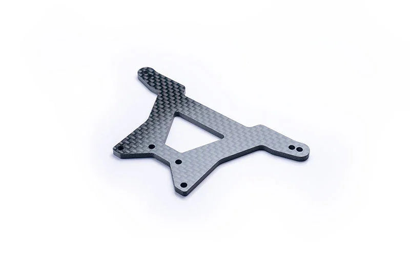 Carbon fiber RC car chassis plate with precision cutouts on white background