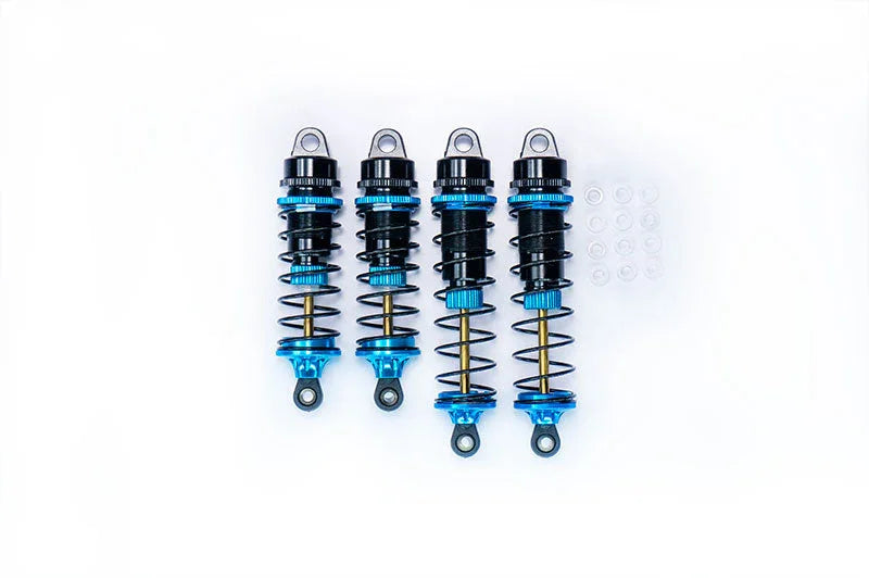 Set of four blue and black RC car shock absorbers with small clear washers on white background