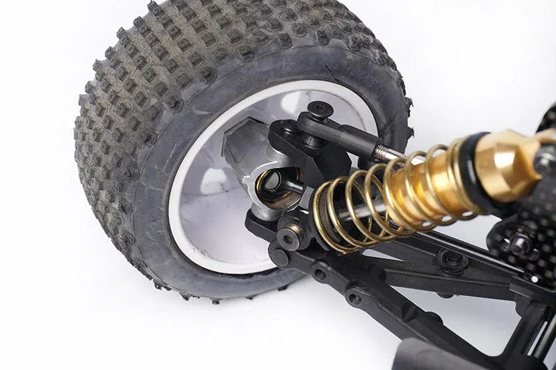 Koswork RC car shock absorber and suspension detail, large knobby rubber tire, metal spring