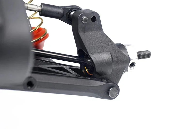 Koswork RC car suspension arm component, black plastic, visible shock spring, closeup detail