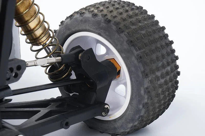 Koswork RC car rear wheel with off-road tire, white rim, suspension, and metal hex hub.