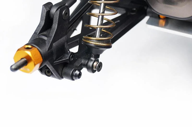 Koswork RC car aluminum shock absorber and suspension arm close-up, black and gold parts.