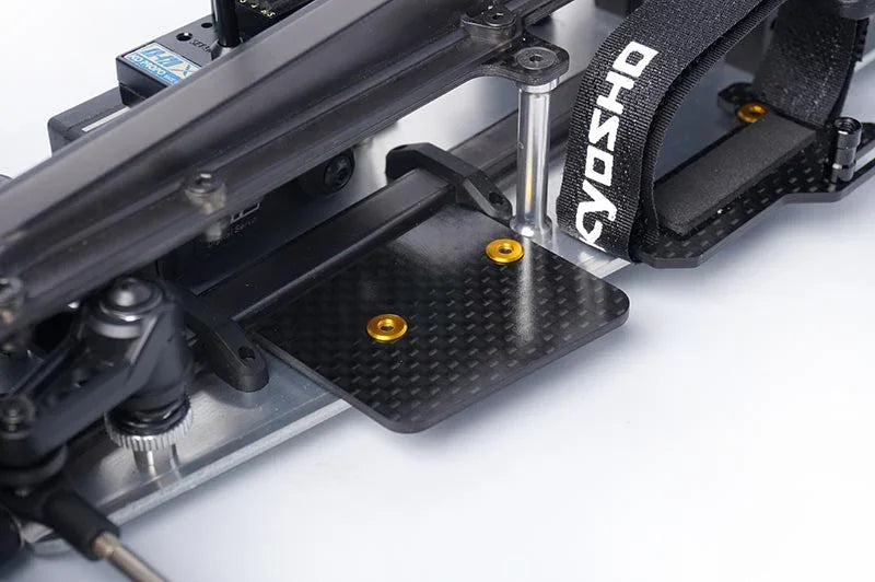 Koswork carbon fiber RC car battery tray with black strap and gold hardware, model KOS04321-5