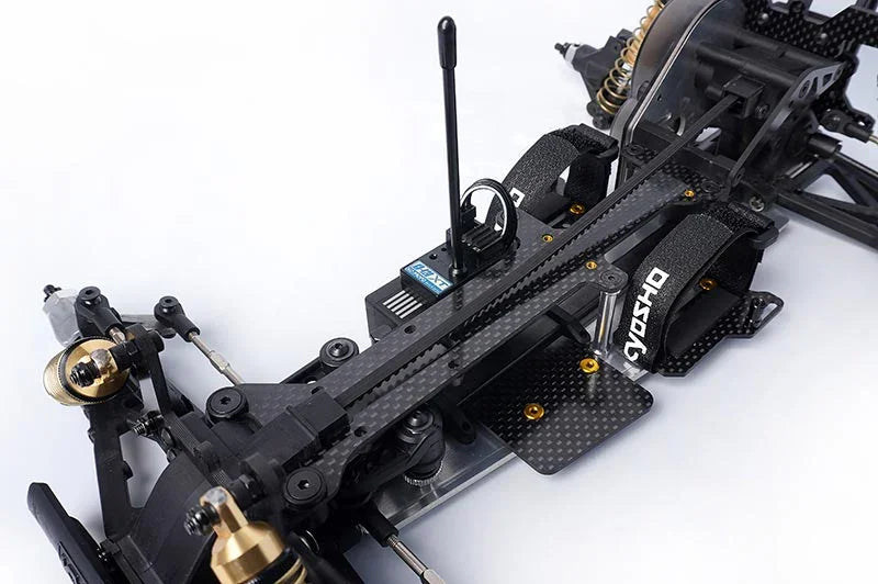 Koswork RC car carbon fiber chassis with Kyosho velcro strap accessories and electronic parts