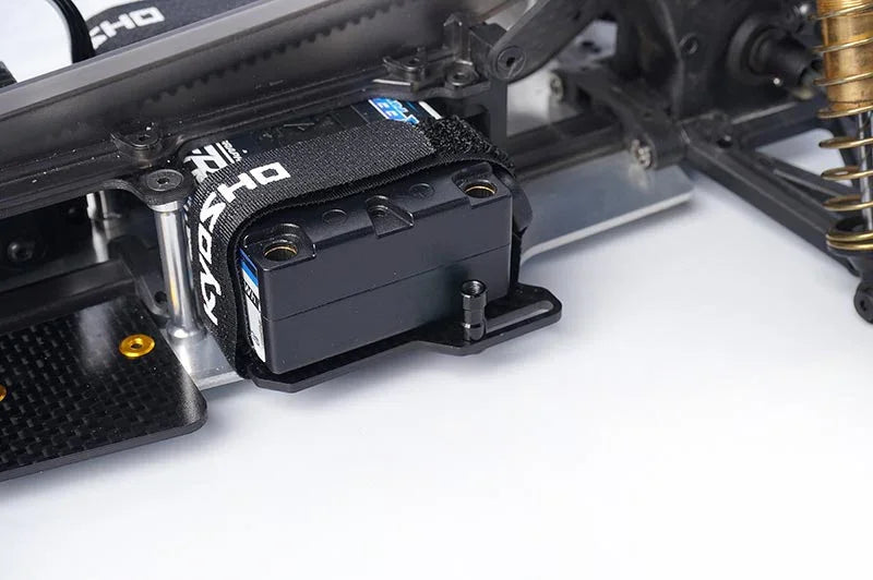 Koswork RC car battery strap, black Velcro mount, installed in chassis, close-up view