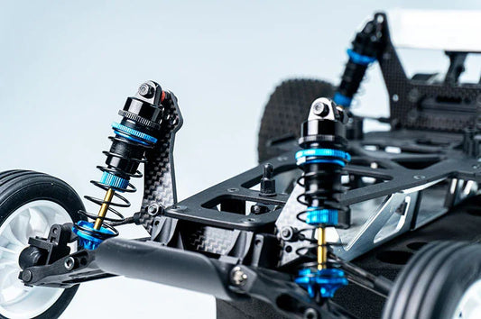 Koswork RC car shock absorbers, blue and black aluminum parts, detailed chassis close-up