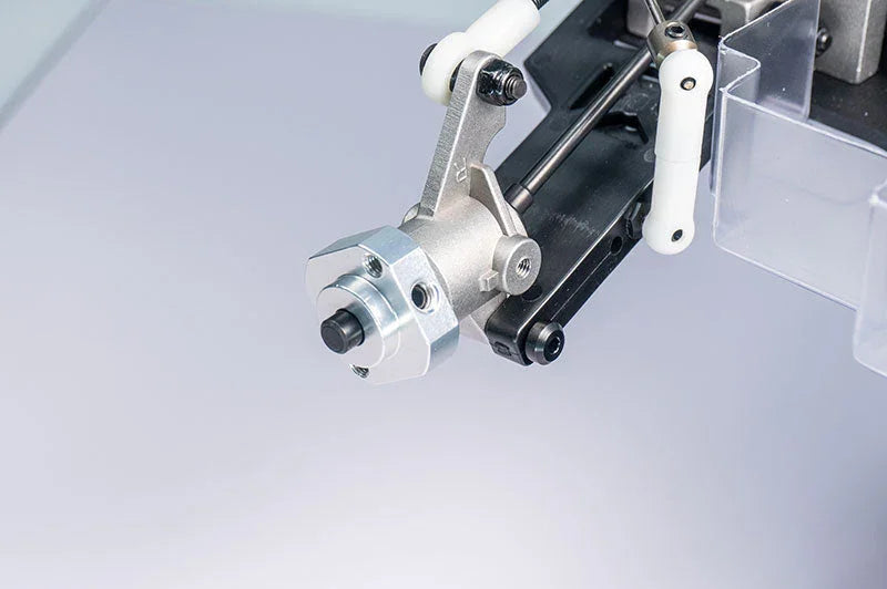 Close-up of RC car aluminum steering assembly and suspension parts