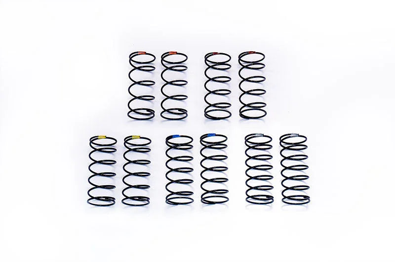 Set of ten black RC car shock springs with colored markings on a white background