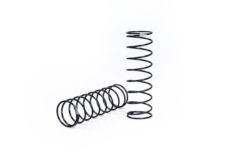Pair of black RC car shock springs on a white background, hobby parts accessory