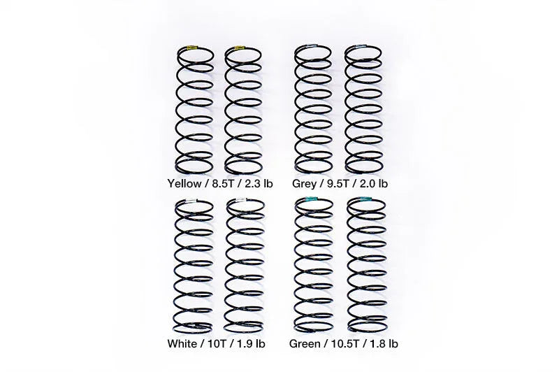 Set of four pairs RC car shock springs labeled yellow, grey, white, green by rate and weight.