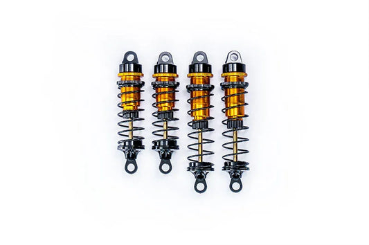 Set of four orange and black RC car shock absorbers with coil springs on white background