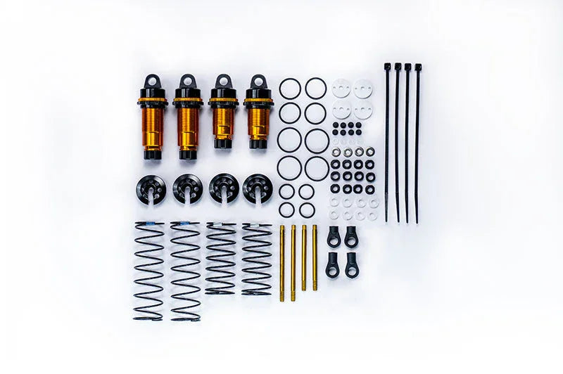 RC car shock absorber kit with springs, O-rings, rods, and accessories on white background
