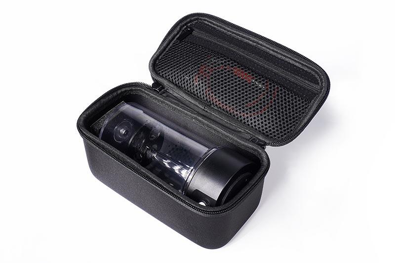 Protective carrying case with a black portable electric tool and mesh pocket organizer