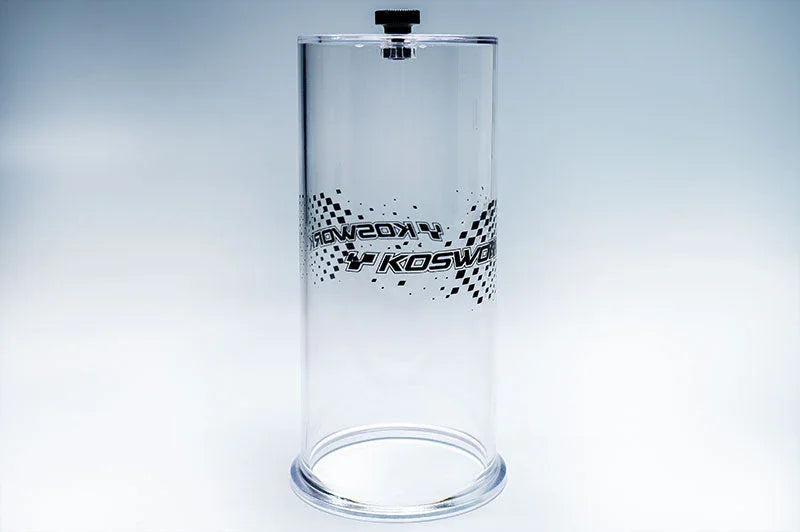 Clear cylindrical RC car tire vacuum chamber with black cap and graphic print