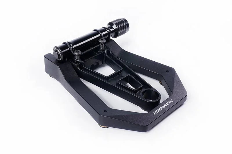 Black Koswork RC car pit stand with adjustable roller, shown on a white background.