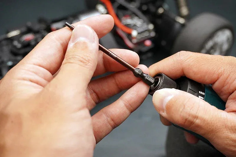 Koswork RC car tool 2.0mm hex driver for model maintenance, shown in use by hand