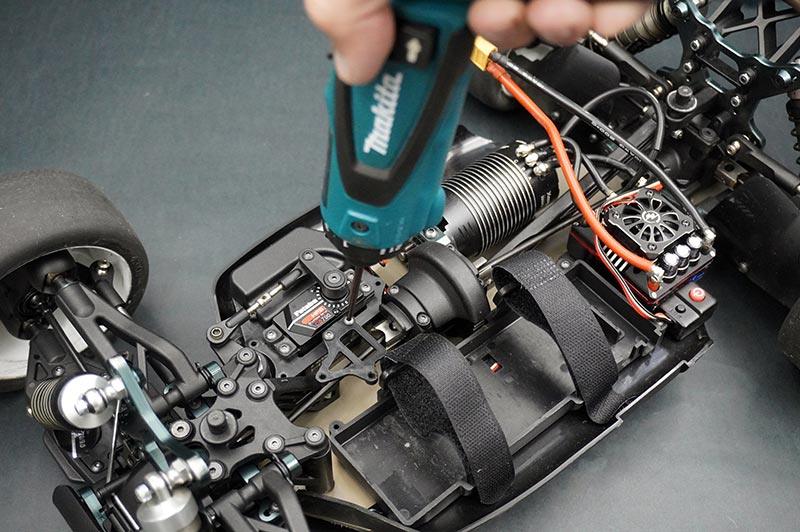 Koswork RC car accessories in use with electric screwdriver on RC chassis, black color, KOS13207-03