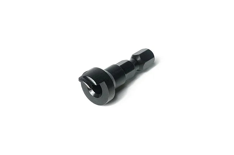 Black metal RC car hex adapter tool on a white background