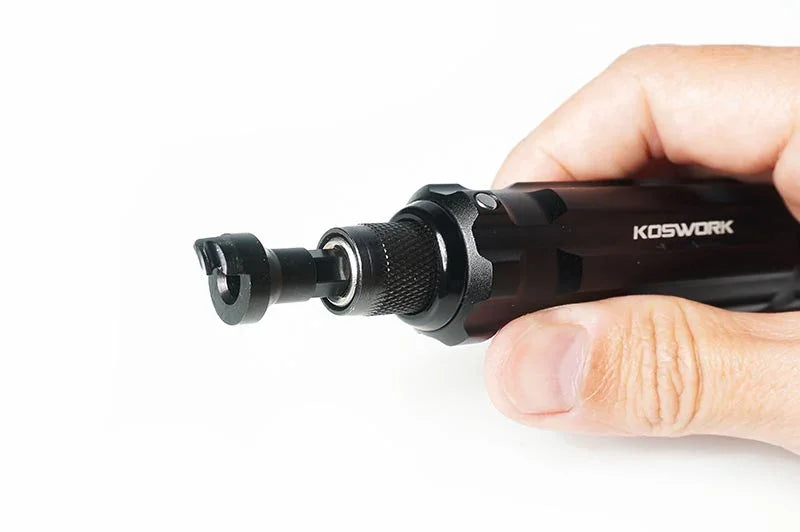Hand holding precision RC C-clamp tool with metal tip for hobby and racing maintenance