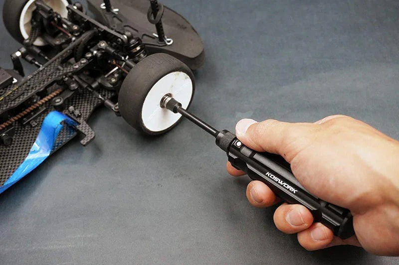 Koswork KOS13210-7 black RC car wrench tool in use on RC car wheel