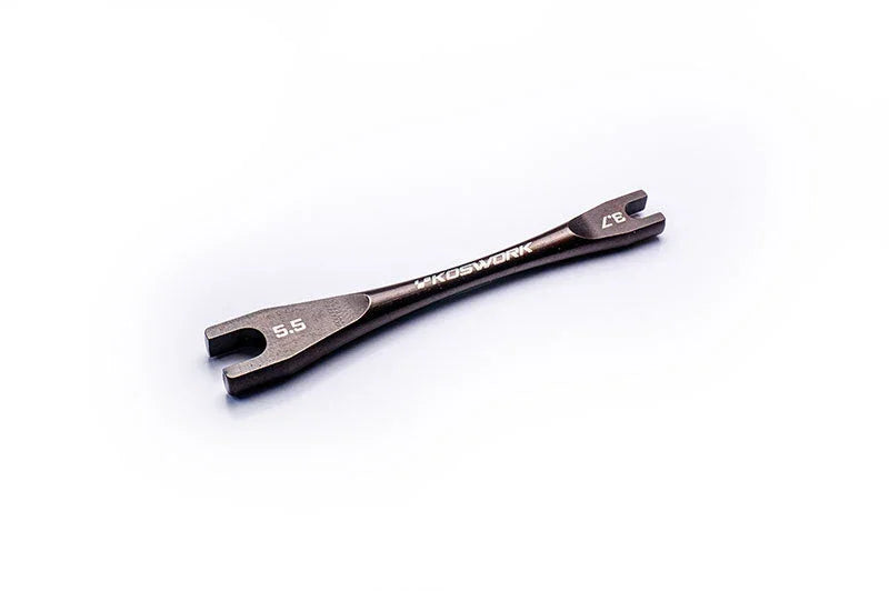 Double-ended RC wrench tool with open ends labeled 5.5 and 7.0 on white background