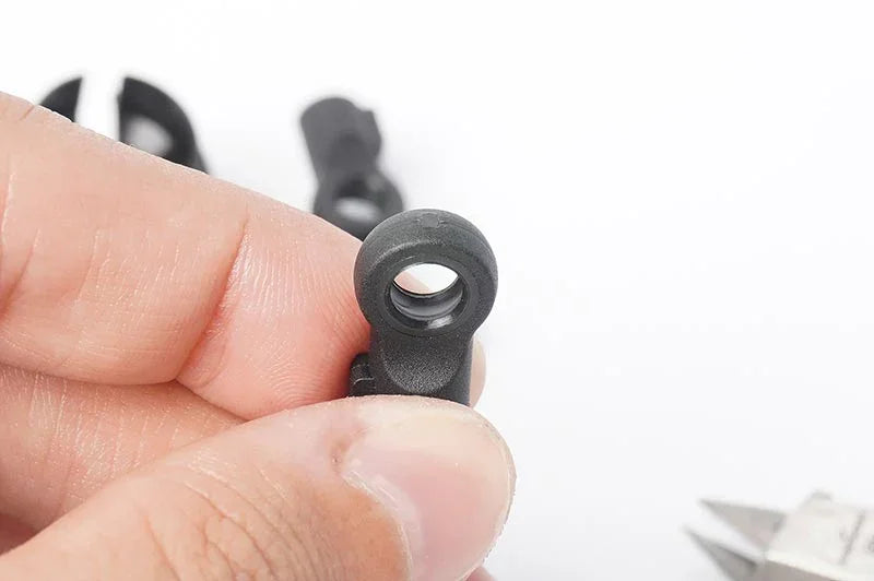 Koswork KOS13274 RC car rod ends black plastic accessory close-up