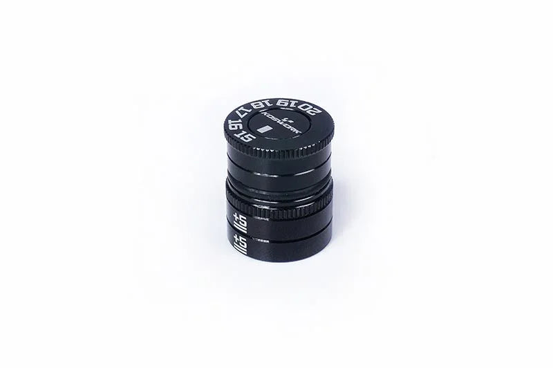 Black aluminum RC camber gauge tool with white angle markings on white background