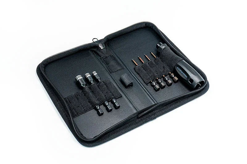 RC toolset in black zippered case with precision driver and bits organized inside.
