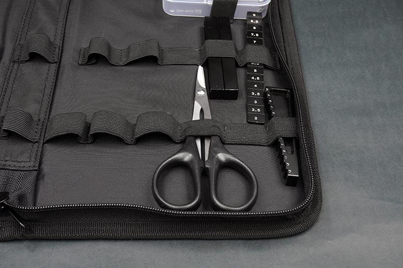 Koswork RC tool bag KOS32215-5 with elastic loops, black nylon, includes scissors and gauge blocks.