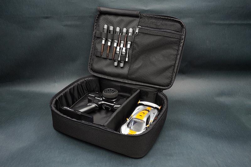Koswork RC car pit bag KOS32216-7, black, with compartments, tools, and RC car inside.