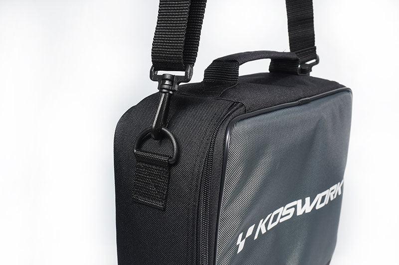 Black Koswork RC pit bag with carry handle and shoulder strap close-up