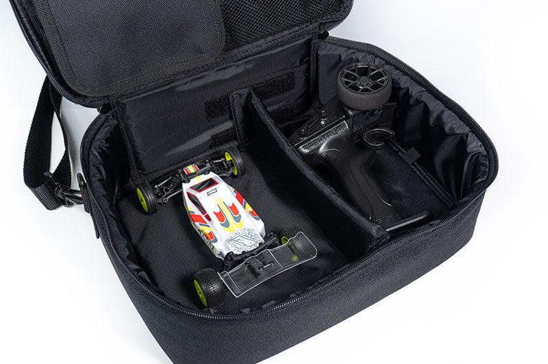 RC car storage bag with divider holding a remote control and mini racing car, black interior