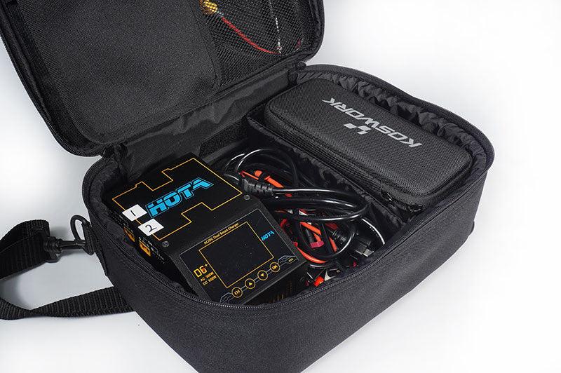 RC charger case with organized cables and Koswork accessory pouch, perfect for pit storage