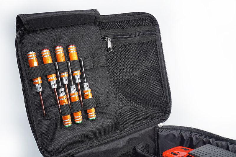 RC tool bag open showing orange hex drivers and mesh zip pocket for remote control accessories